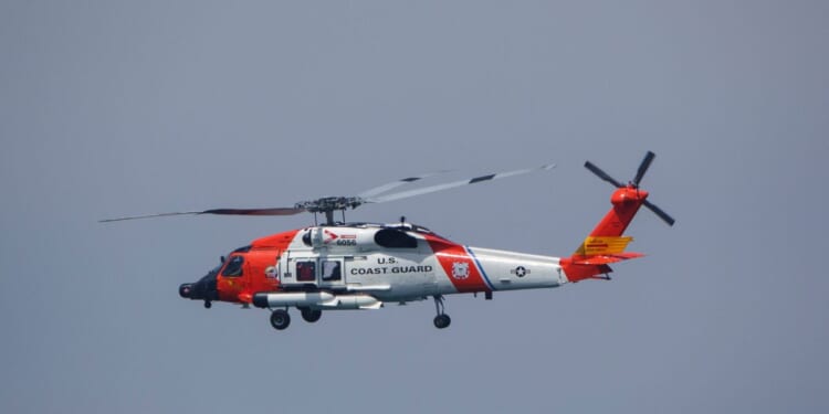 A U.S. Coast Guard Sikorsky MH-60T Jayhawk helicopter flies to the U.S. Coast Guard Sector San Diego air station on June 28, 2025, in San Diego, California.