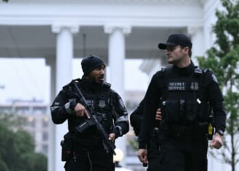 Secret Service agents are seen after a lockdown was lifted at the White House in Washington, D.C., on May 23, 2026.