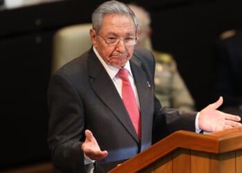 Former Cuban President Raul Castro standing