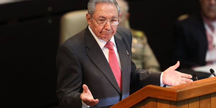 Former Cuban President Raul Castro standing