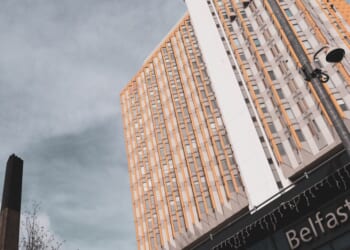 The high rise tower of Belfast City Hospital and adjacent to it the smokestack of the hospital's incinerator in Belfast, Northern Ireland, on March 23, 2019.