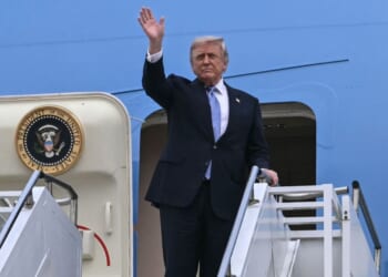 President Donald Trump boards Air Force One before his departure from Beijing Capital Airport in Beijing on May 15, 2026.