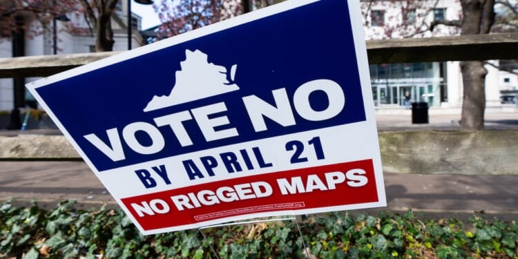 A sign urges early voters to vote no on the Virginia redistricting referendum.