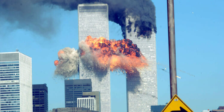 A fiery blasts rocks the World Trade Center after being hit by two planes September 11, 2001 in New York City.