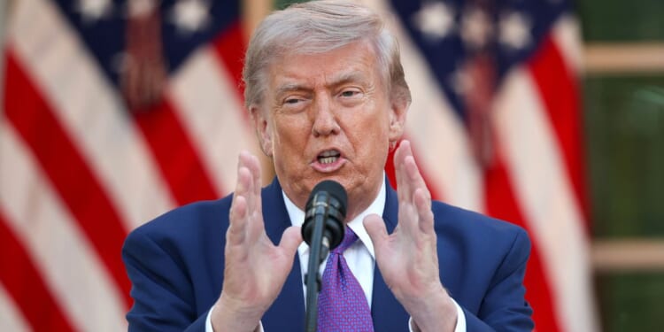 President Donald Trump delivers remarks at a "Rose Garden Club" dinner for National Police Week in the Rose Garden at the White House on May 11, 2026, in Washington, D.C.