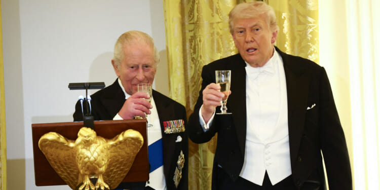 King Charles and President Donald Trump in white-tie raise a toast.