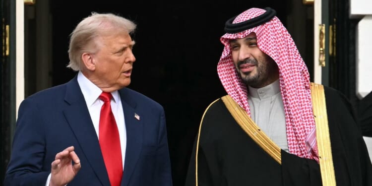 President Donald Trump greets Crown Prince and Prime Minister of the Kingdom of Saudi Arabia Mohammed bin Salman on the South Lawn at the White House in Washington, D.C., on Nov. 18, 2025.