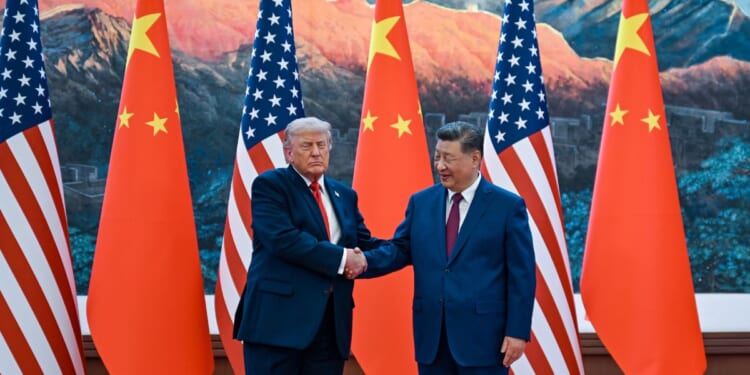 President Donald Trump and Chinese President Xi Jinping participate in a welcoming ceremony at the Great Hall of the People on May 14, 2026, in Beijing, China.