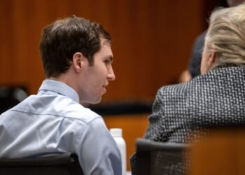 Tyler Robinson, left, speaks with his attorney Kathryn Nester in 4th District Court in Provo, Utah, on April 17.
