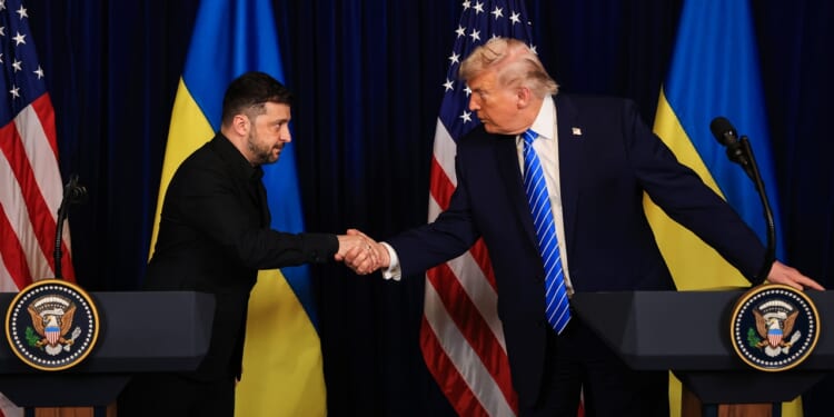 U.S. President Donald Trump and Ukrainian President Volodymyr Zelensky shaking hands