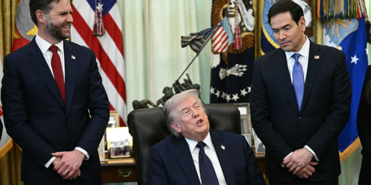 JD Vance and Marco Rubio flank President Trump as he sits at his desk in Oval Office,
