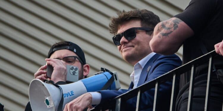 Social media influencer Nick Fuentes, pictured in a 2024 file photo after being ejected from a Turning Point USA event in Detroit.