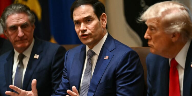 Secretary of State Marco Rubio speaks alongside Secretary of the Interior Doug Burgum and President Donald Trump during a meeting in the Cabinet Room of the White House in Washington, D.C., on May 27, 2026.