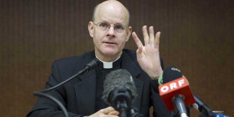 Cardinal fires D.C. exorcist who said UFOs are mostly demons in disguise