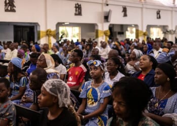 Roman Catholics gather for a mass at the Church of the Assumption in Lagos, Nigeria, on April 21, 2025.