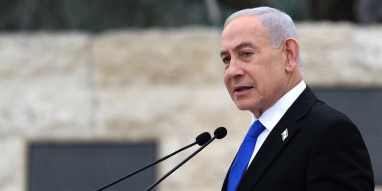Israel’s Netanyahu says strikes on Iran are on hold, vows forceful response if attacked again