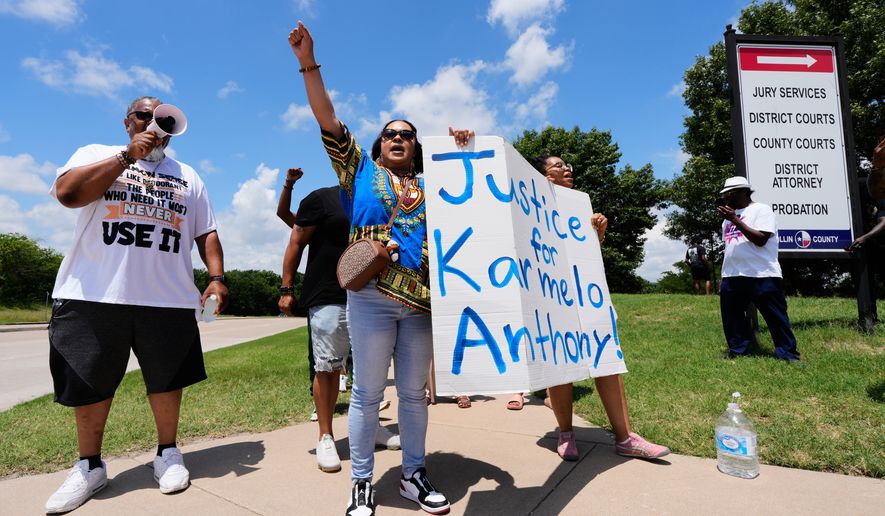Supporters for Karmelo Anthony demonstrate in front of the Collin County courthouse Thursday, June 4, 2026, in McKinney, Texas. (AP Photo/Tony Gutierrez)