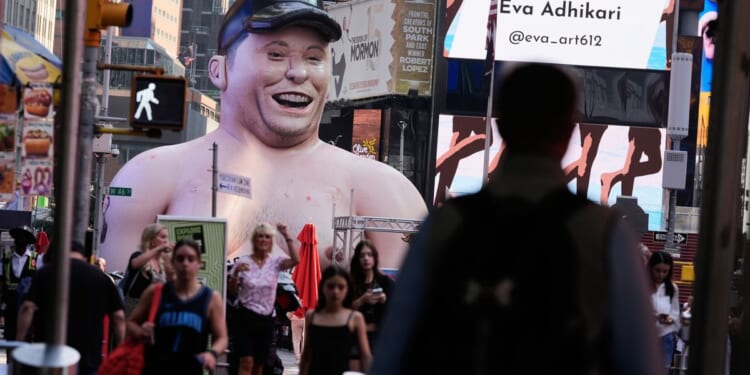 Elon Musk protest inflatable appears in Times Square ahead of SpaceX IPO