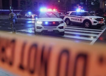 Bystander wounded in shooting near White House still undergoing treatment, has retained a lawyer