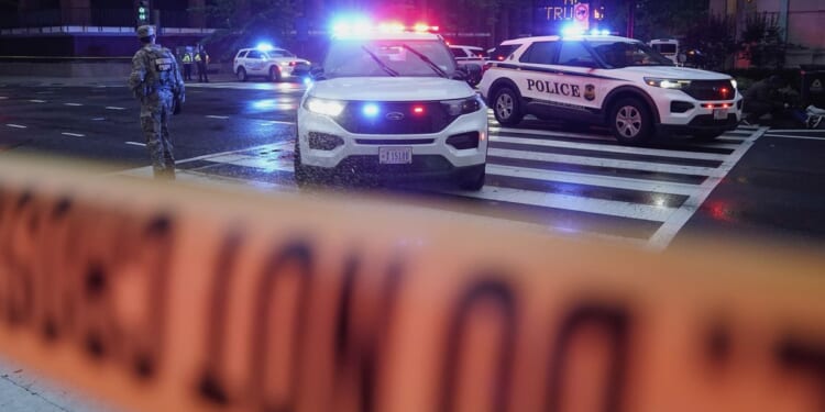 Bystander wounded in shooting near White House still undergoing treatment, has retained a lawyer
