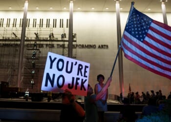 Workers begin removing Trump’s name from the Kennedy Center, hours after a court-ordered deadline