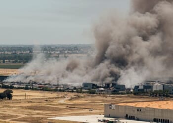 Unhealthy air quality in California city as huge warehouse fire burns for third day