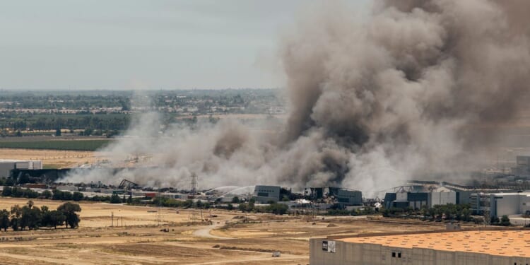 Unhealthy air quality in California city as huge warehouse fire burns for third day