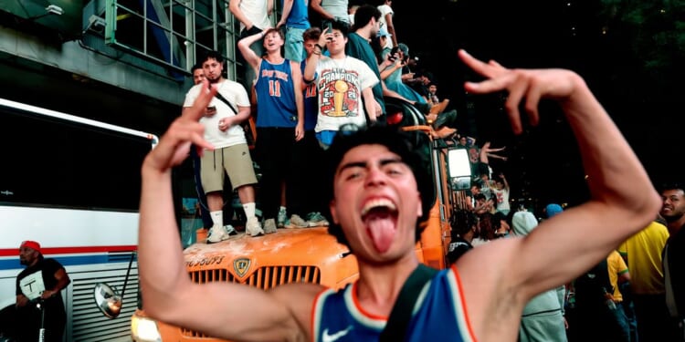 Mayhem mars euphoria as New York City celebrates the Knicks’ first championship in 53 years
