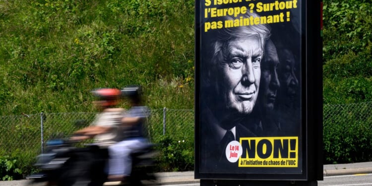 Early results show Swiss voters reject right-wing’s bid to cap population at 10 million