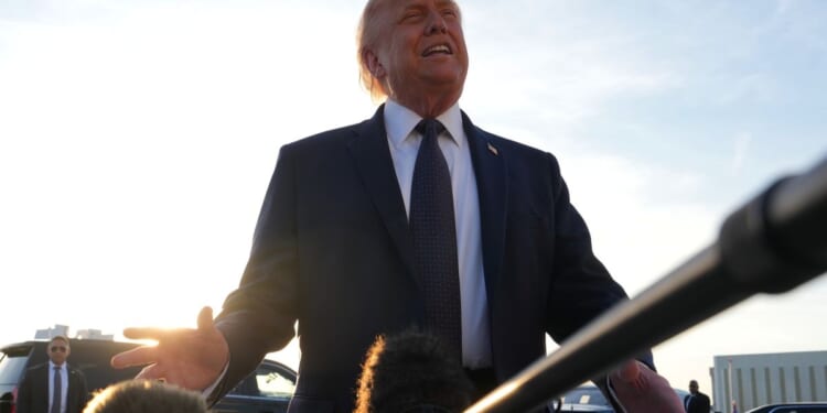 Trump says Iran deal will stave off economic crisis, prevent nuclear program