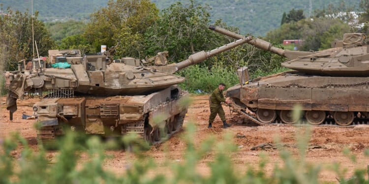 Israel says its troops will stay in southern Lebanon, directly contradicting U.S.-Iran agreement