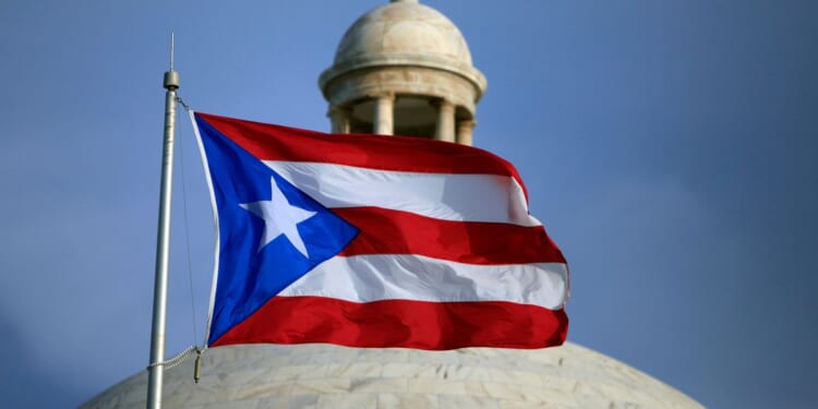 Puerto Rico roiled by widening political crisis as top official comes under fire