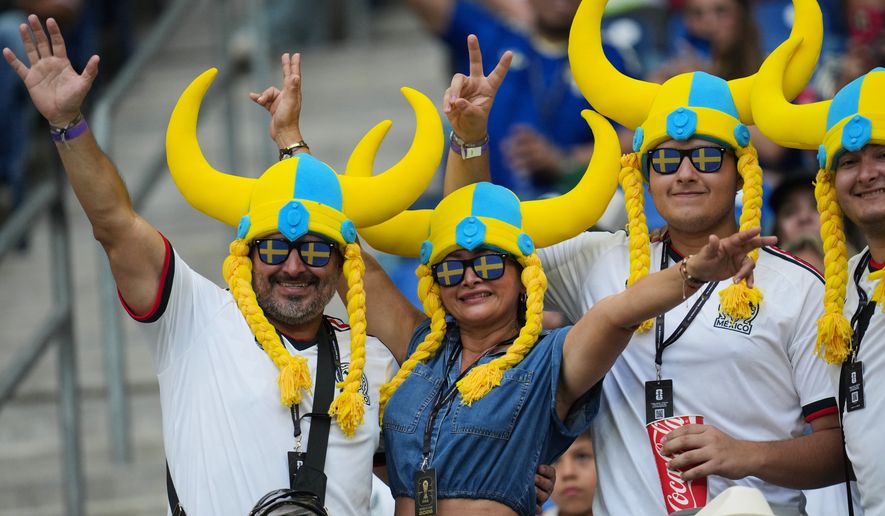 Fans react ahead of the World Cup Group F soccer match between Sweden and Tunisia in Guadalupe, near Monterrey, Mexico, Sunday, June 14, 2026. (AP Photo/Matias Delacroix)