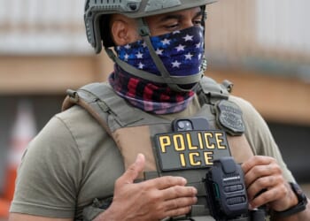 DOJ sues New York over federal agent mask ban