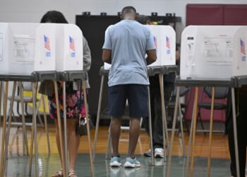 Federal judge bars Trump from implementing proof of citizenship requirement to vote