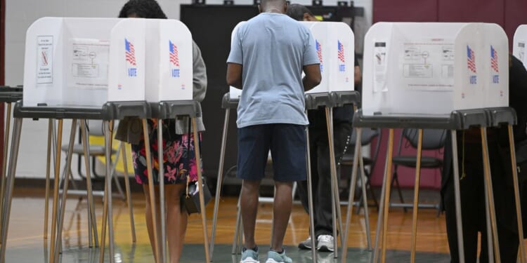 Federal judge bars Trump from implementing proof of citizenship requirement to vote