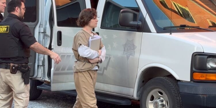 A member of the cultlike Zizians group is charged in the killings of her parents in Pennsylvania
