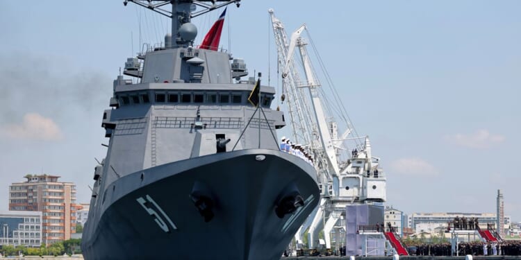 North Korea’s Kim claims progress on nuclear-armed navy as new warship is placed into service