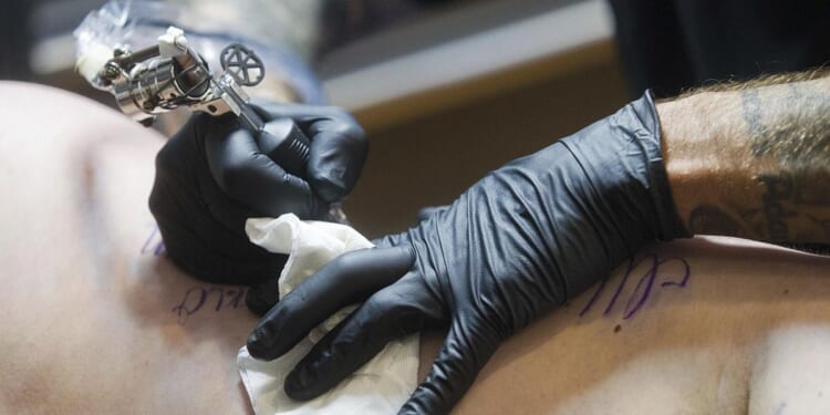 Florida tattoo shop draws backlash after owner bans military, calls troops ‘war criminals’