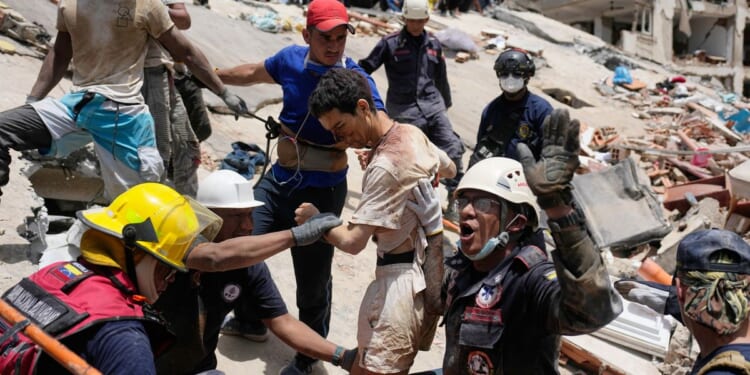 As survivors are pulled from rubble of Venezuela earthquakes, relatives of missing hold out hope