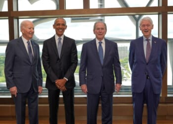 Former President Joe Biden, former President Barack Obama, former President George W. Bush, and former President Bill Clinton pose ahead of the dedication ceremony for the opening of the Barack Obama Presidential Center, in John Lewis Plaza, on June 18, 2026, in Chicago, Illinois.