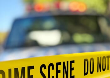 The child reportedly took the gun from where it was stored under a mattress. The owner of the gun was also charged with murder.