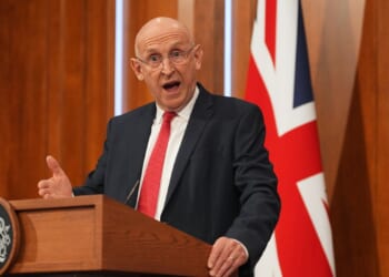 British defense minister resigns after losing battle for increased military spending