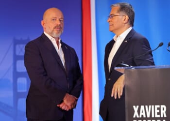 Steve Hilton and Xavier Becerra speak during a California gubernatorial debate.