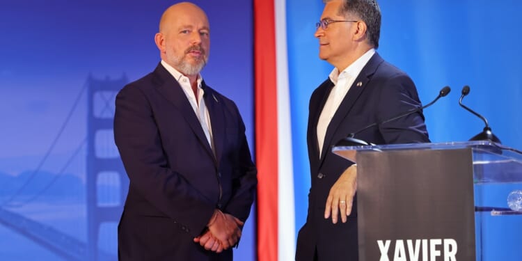 Steve Hilton and Xavier Becerra speak during a California gubernatorial debate.
