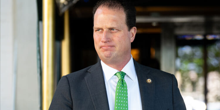 Rep. August Pfluger, R-Texas, leaves the House Republican Conference caucus meeting at the Capitol Hill Club in Washington on Wednesday, May 13, 2026.
