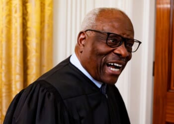 Associate Supreme Court Justice Clarence Thomas, seen in a May 22 photo, chuckled at a reporter's persistent questions Monday, but declined to answer.