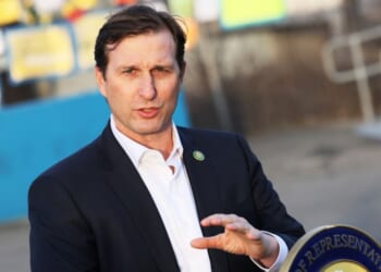 Rep. Dan Goldman speaks during a press conference at the entrance of the migrant relief center at Brooklyn Cruise Terminal on Feb. 2, 2023, in New York City.