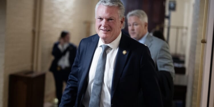 Rep. Mike Collins, R-Ga., leaves a meeting of the House Republican Conference in the U.S. Capitol.