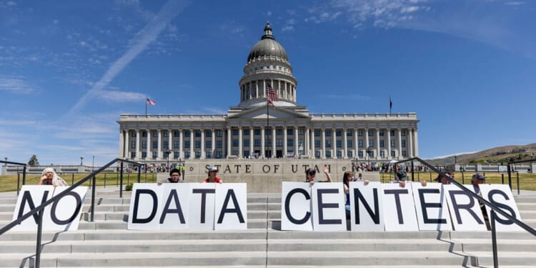 Demonstrators take part in a May 23 protest at the Utah State Capitol to oppose the construction of the Stratos data center in Box Elder County in Salt Lake City, Utah. The proposed data center would be about 40,000 acres and is speculated to use 9 gigawatts of power.